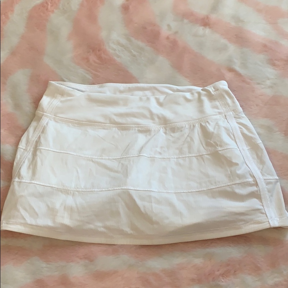 White pleated Lululemon tennis skirt